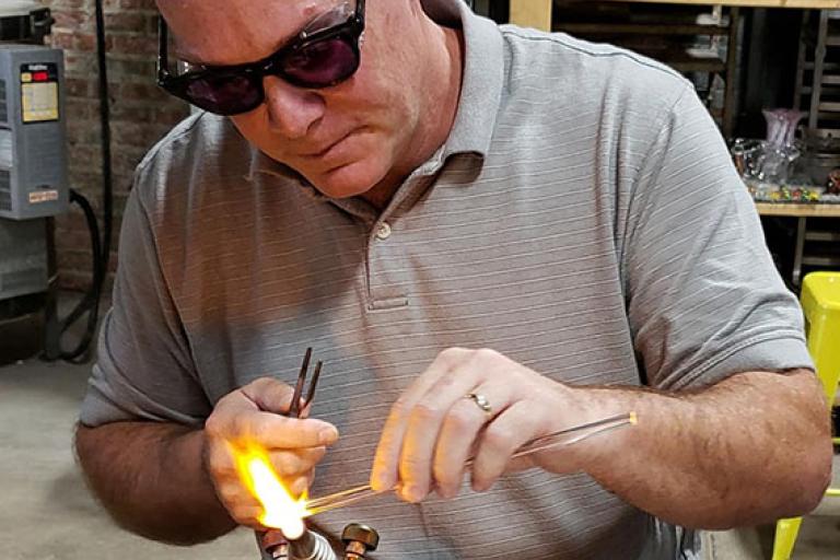 David Graeber working glass in a flame