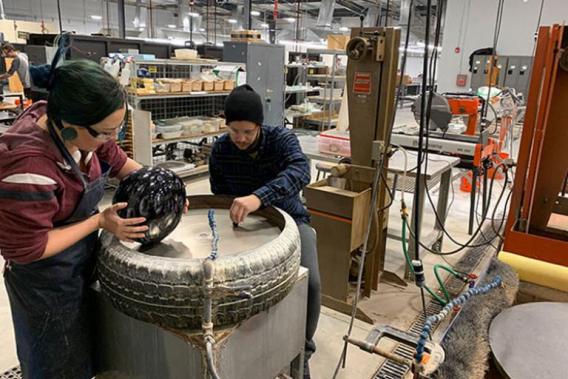 Students working in the cold working studio